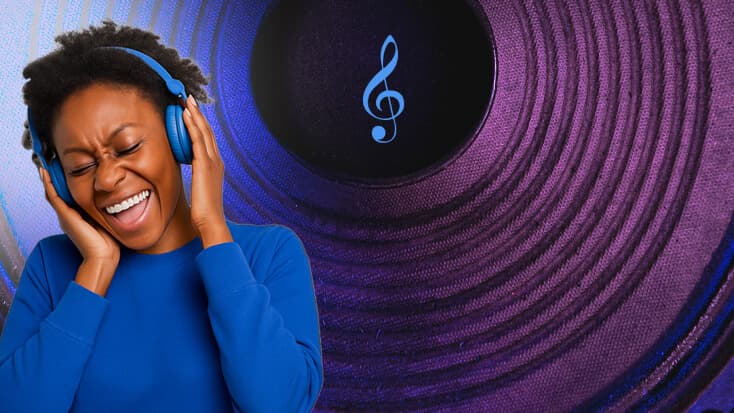 A person wearing headphones and smiling